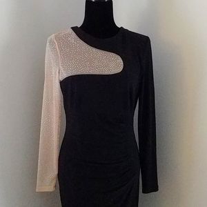 Frank Lyman black and nude cocktail dress.